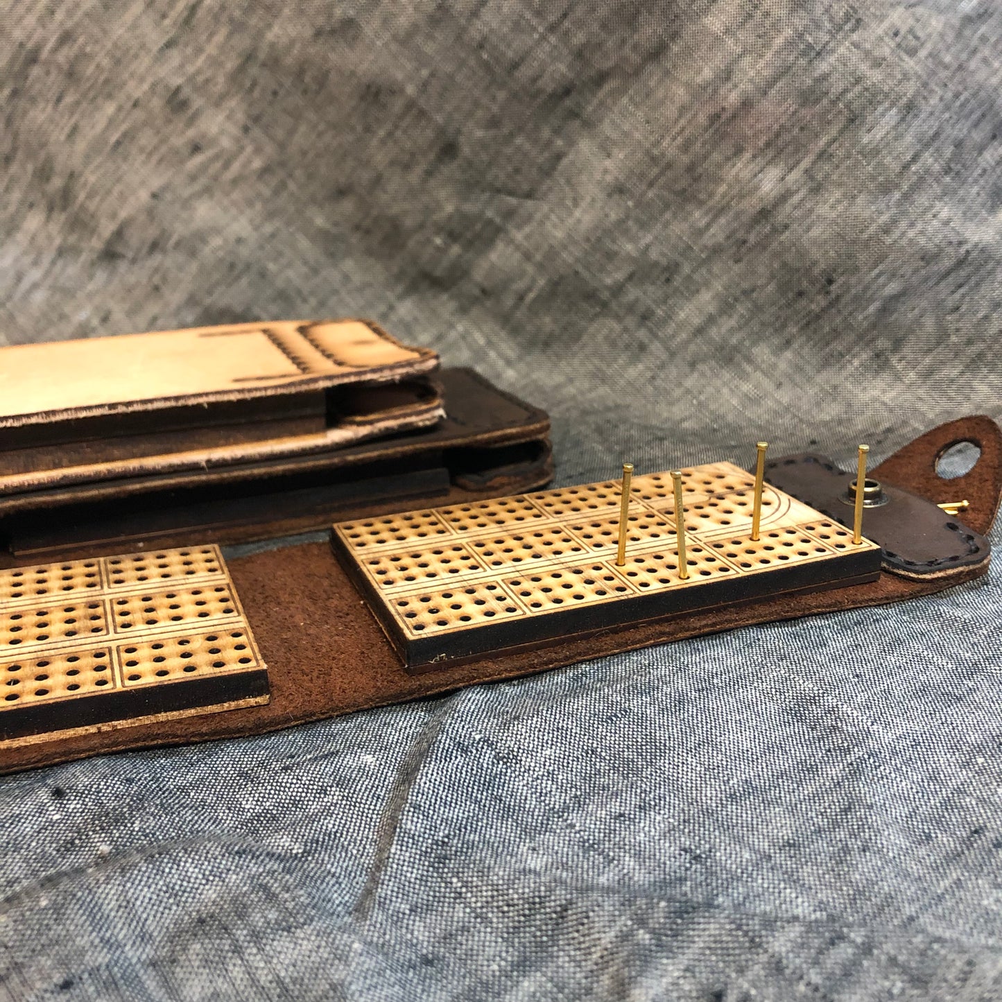 
                  
                    Travel-Size Leather Cribbage Board
                  
                