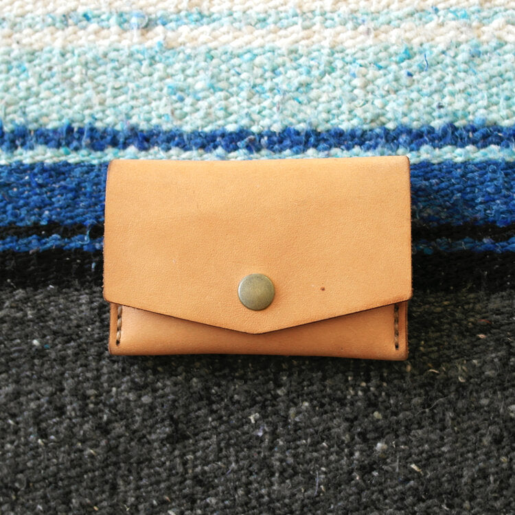 
                  
                    Snap Leather Wallet
                  
                