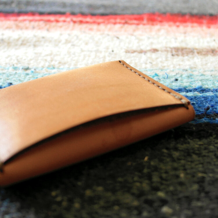 
                  
                    Snap Leather Wallet
                  
                