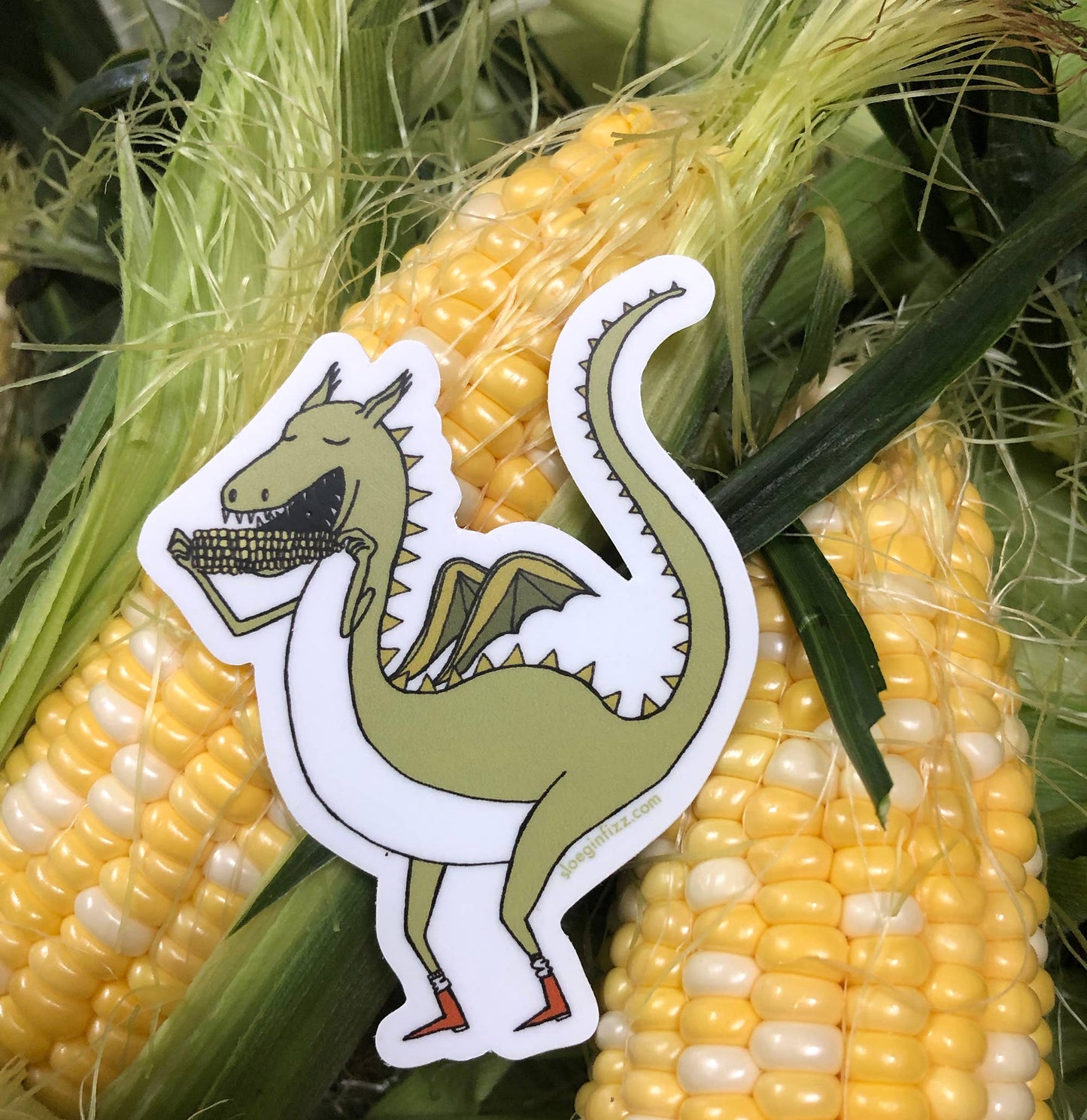 
                  
                    Dragon Eats Corn on the Cob Sticker
                  
                